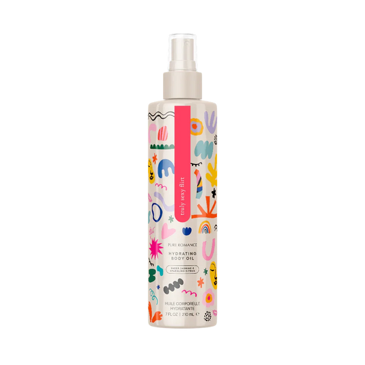 Hydrating body oil spray with colorful abstract design on bottle, skincare product