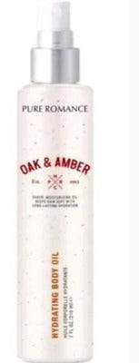 Oak & Amber hydrating body oil spray bottle with white and gold design