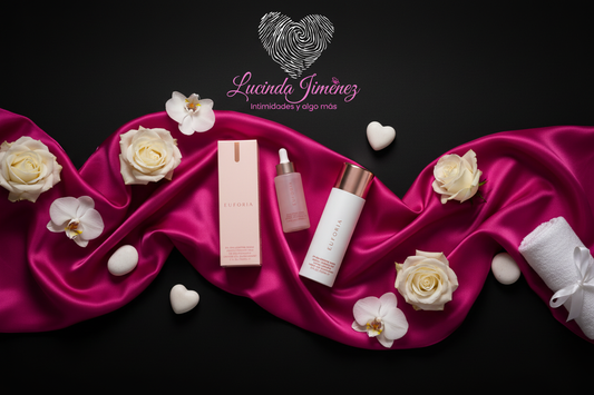 Intimate care products with pink satin, white roses, orchids, and spa accessories on black background