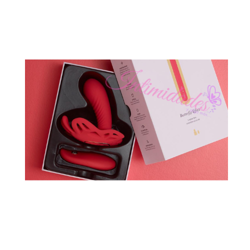 Red butterfly-shaped silicone personal massager in open box on a pink background
