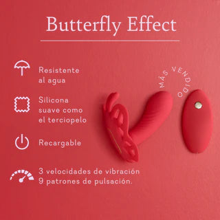 Red silicone butterfly-shaped massager on red background with product features in Spanish.