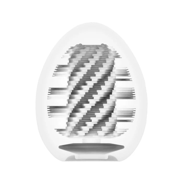 Textured egg-shaped silicone sleeve with spiral ridges, wellness and massage accessory