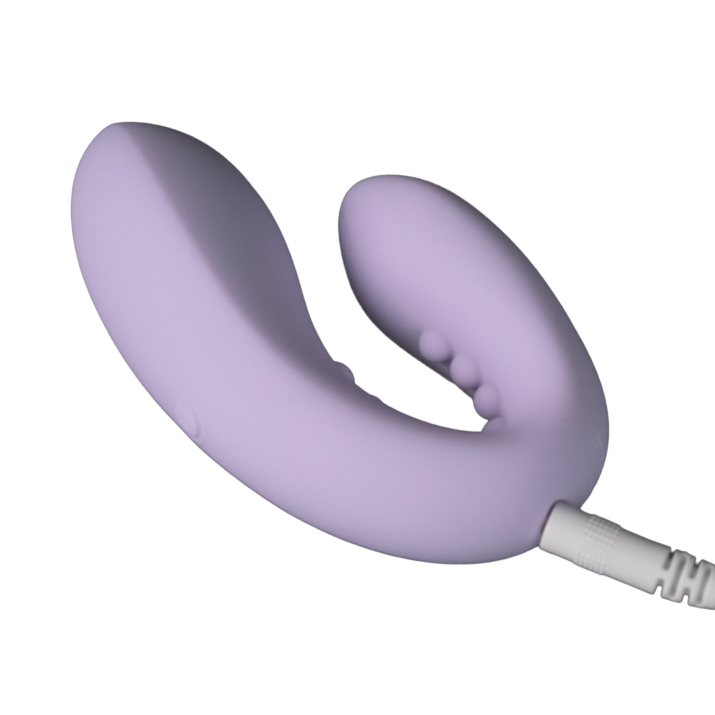 Purple silicone personal massager with curved design and textured nodes, wellness device