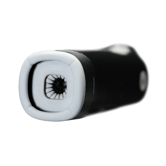 Black and white male wellness massager with soft textured opening on dark background