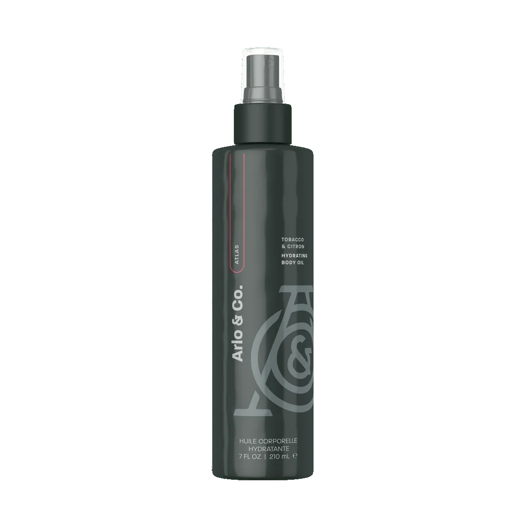 Arlo & Co. Atlas tobacco and citron hydrating body oil in sleek black spray bottle