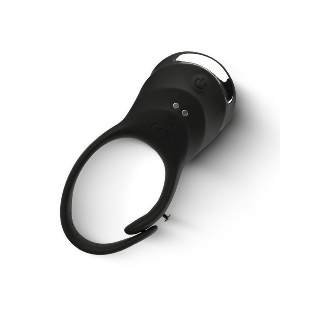 Black silicone vibrating couples ring with power button and silver accent for intimate wellness