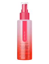 Pink ombre water-based personal lubricant bottle with a spray nozzle, labeled strawberry lemonade.