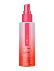 Strawberry lemonade scented spray in a pink gradient bottle with a pump dispenser.