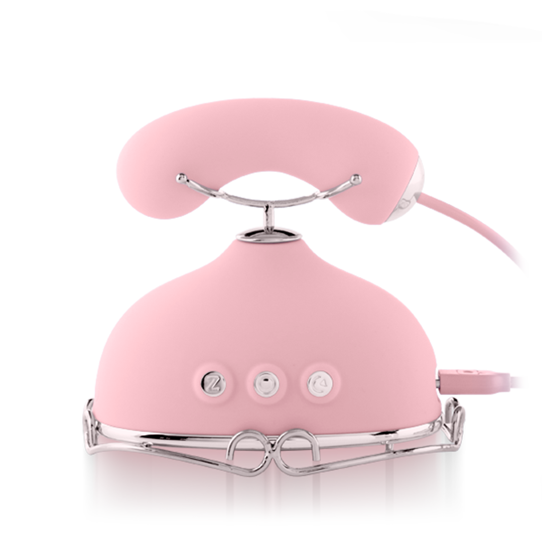 Pink modern massage device with ergonomic handle and control buttons on white background