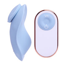 Blue silicone personal massager with remote control on white background