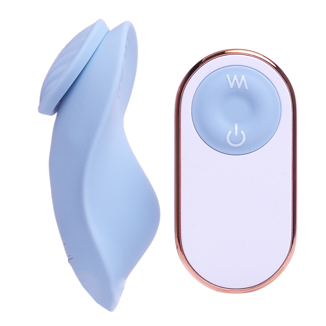 Blue silicone personal massager with matching wireless remote control on white background