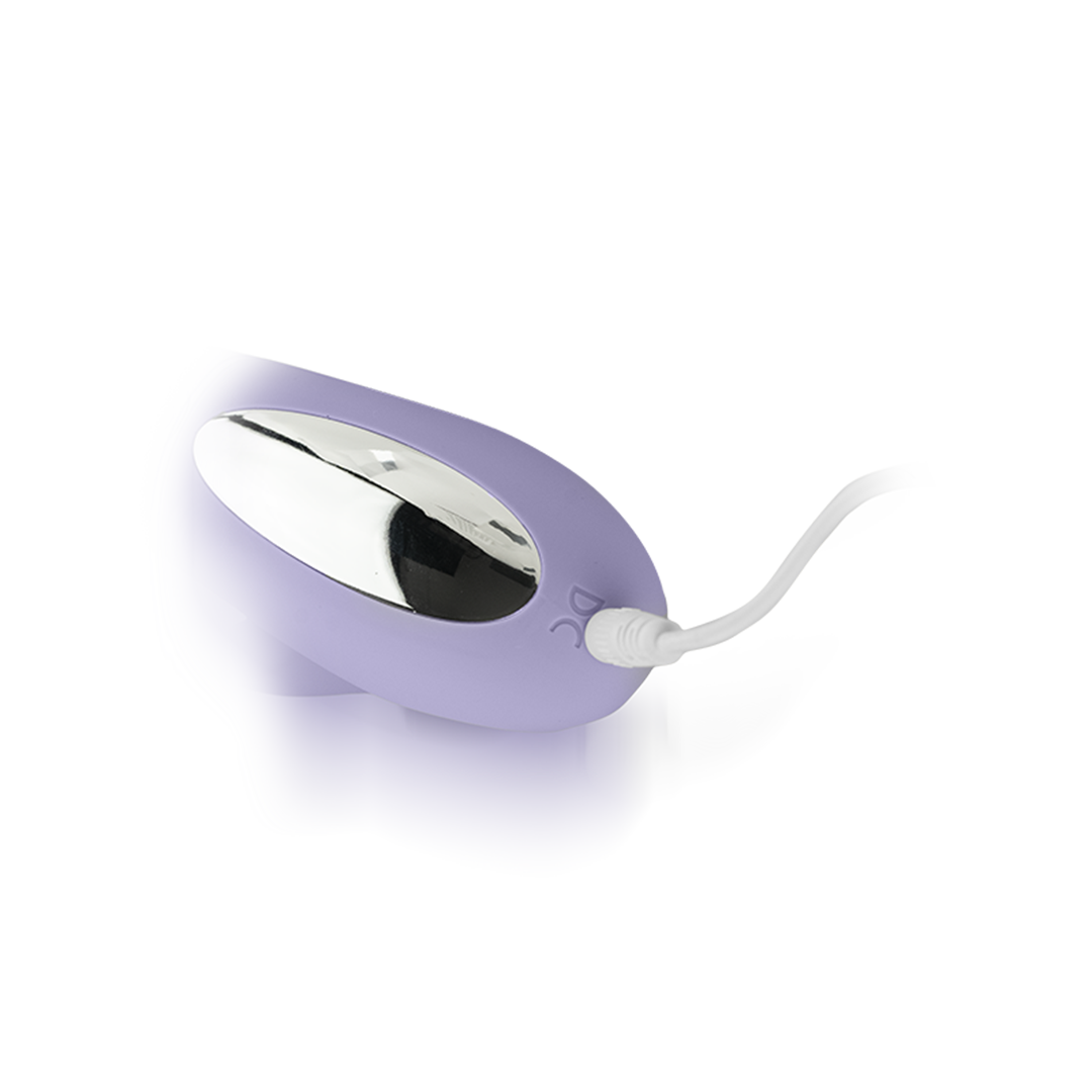 Purple rechargeable handheld personal massager with metallic accent on white background