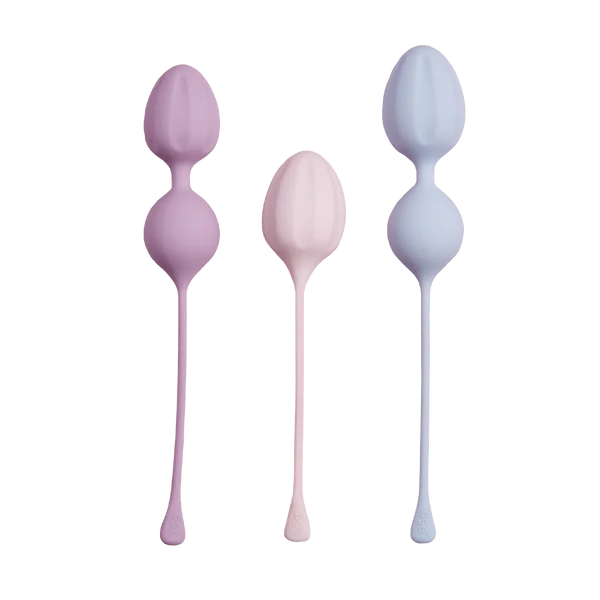 Set of three pastel kegel exercise balls for pelvic floor strengthening