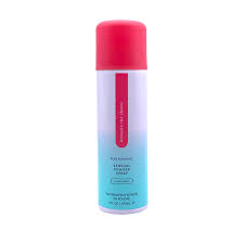 Between the Sheets Island scented spray in blue and pink bottle for skin wellness