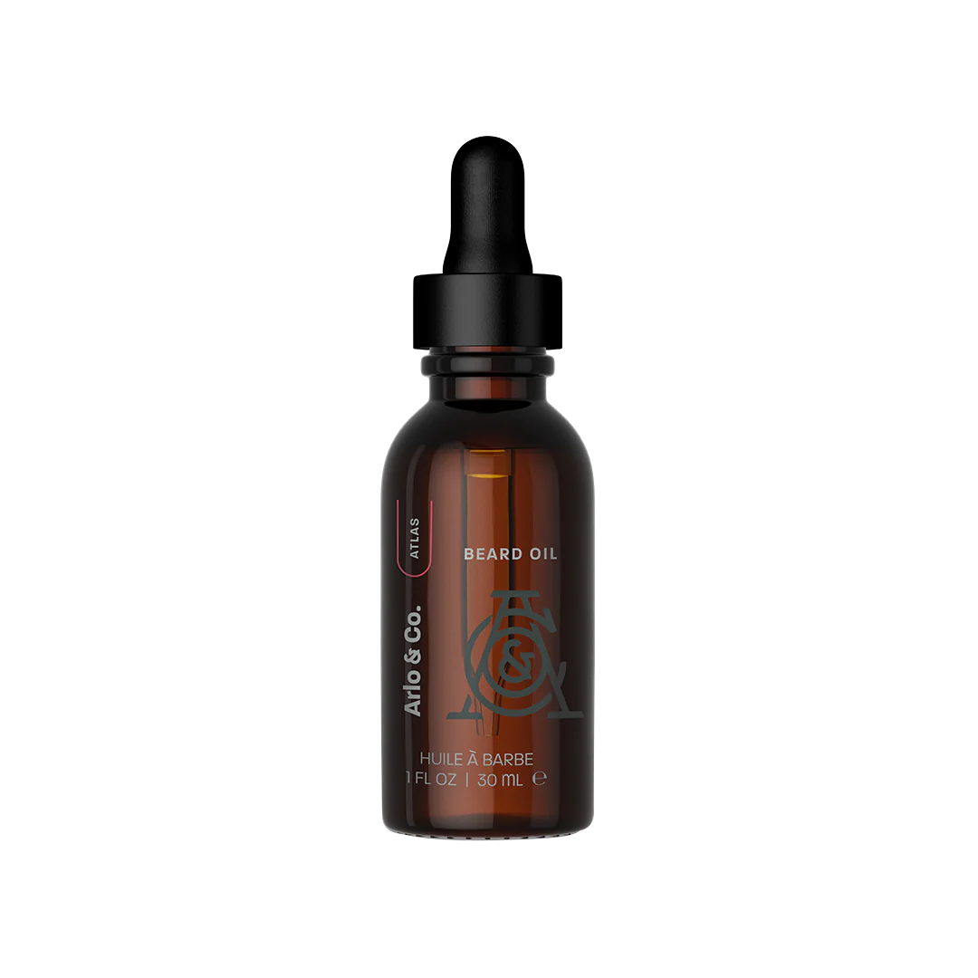 Amber dropper bottle labeled beard oil for grooming and skin care, 30ml size