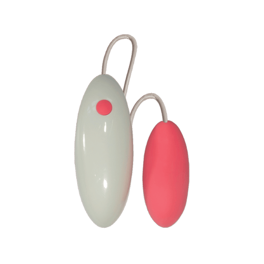 Pink and white remote-controlled bullet massager with attached cord, isolated on white background