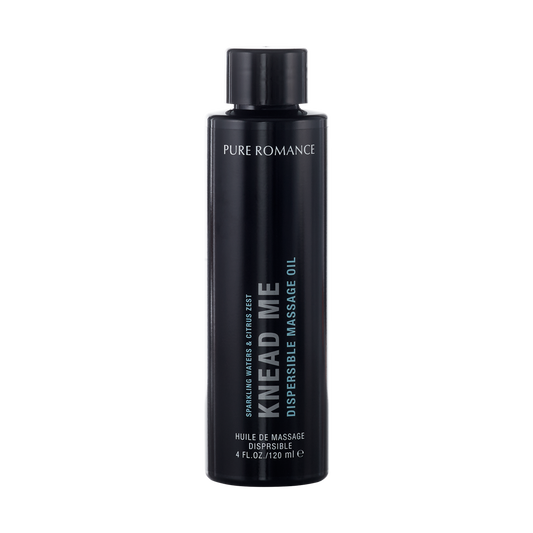 Pure Romance Knead Me dispersible massage oil bottle, 120ml, for skin wellness and massage.